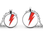 David Bowie Ziggy Stardust Lighting Bolt Necklace Key Ring Tie Clip Jewelry Sets. Fixed Price $12.95.