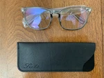 Livho High Tech Blue Light Glasses - 99% Blocking Translucent Gray. Fixed Price $10.00.