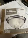 11 In. 2-LIGHT Brushed Nickel Flush Mount Frosted. Fixed Price $24.00.