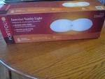 Portfolio Vanity Light Brushed Steel Finish Frosted Glass Shade 2 Bulb Fixture. Fixed Price $25.00.