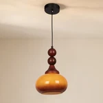 7IN Mid Ancient Style Caramel Colored Glass Pendant Light, Home Decoration. Fixed Price $94.40.