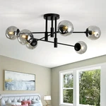 Szxykeji 6-LIGHTS Glass Globe Sputnik Chandelier Modern Flush Mount Ceiling. Fixed Price $148.87.