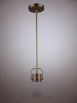Home Decorators Shelston 10 In. 1-LIGHT White And Brass Farmhouse Pendant. Fixed Price $35.66.