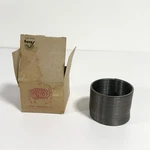 Vintage Metal Slinky Toy Early James Industries Portico Street W/ Box No. 10050. Fixed Price $69.30.