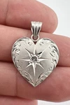 Designer .900 Platinum .14CT Round Brilliant Diamond Engraved Love Heart Pendant. Fixed Price $995.00.