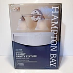 Hampton Bay Ashhurst 2-LIGHT Brushed Nickel Vanity W/ Frosted Glass Shade. Fixed Price $28.99.
