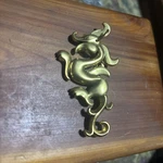 Golden Dragon Brooch Pin Pendant Vintage Metropolitan Museum Of Art Tone. Fixed Price $27.00.