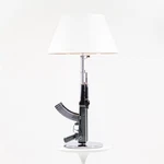 2021 Philippe Starck & Flos Gun Table Dimmable Floor Lamp In Chrome 6X Available. Fixed Price $2900.00.