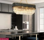 8 - Light Dimmable Tiered Chandelier With Crystal Accents (adjustable Length). Fixed Price $169.99.