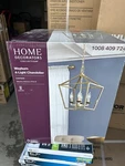 Home Decorators Weyburn 4-LIGHT Gold Chandelier New. Fixed Price $40.00.