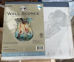 New Open Box Hampton Bay Art Glass Wall Sconce Never Used. Fixed Price $29.99.