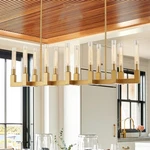 Tacdandm 54-INCH Linear Dining Room Pendant Light Fixture With Glass Tube,gold. Fixed Price $485.00.