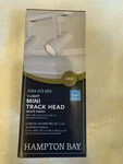 Hampton Bay White 1-LIGHT Integrated Led Mini-cylinder Linear Track Lighting Hd. Fixed Price $19.50.