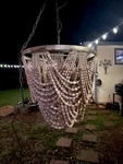 Creative Co-op Metal Chandelier With Draped Wood Beads 25" X 26. Fixed Price $249.00.