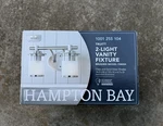 Hampton Bay Truitt 2-LIGHT Brushed Nickel Vanity Fixture Clear Glass Shades. Fixed Price $30.00.