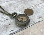 Amber Glass Pocket Watch Necklace Round Pendant Chain & Battery Included. Fixed Price $11.99.