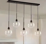 Goyeel Glazure 5-LIGHT Matte Black Linear Island Pendant With Clear Glass. Fixed Price $99.99.
