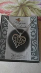 Cathedral Filigree Heart Pendant Necklace Silver Tone. Fixed Price $34.49.