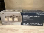 Hampton Bay Olgelthorpe 22IN 3-LIGHT Brushed Nickel Vanity Fixture. Fixed Price $19.99.