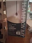 Hampton Bay Pavlen 1-LIGHT Bronze Pendant With Clear Glass Shade 1005 936 230. Fixed Price $19.00.