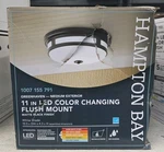Hampton Bay 11 In. Round Black Exterior Outdoor Motion Sensing Led Ceiling Light. Fixed Price $28.99.